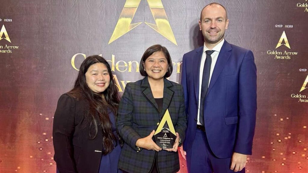 (From left) Holcim Philippines senior legal counsel Kristine Manalo, general counsel and corporate secretary Belinda Dugan, and president and CEO Nicolas George during the Golden Arrow Awards ceremony.